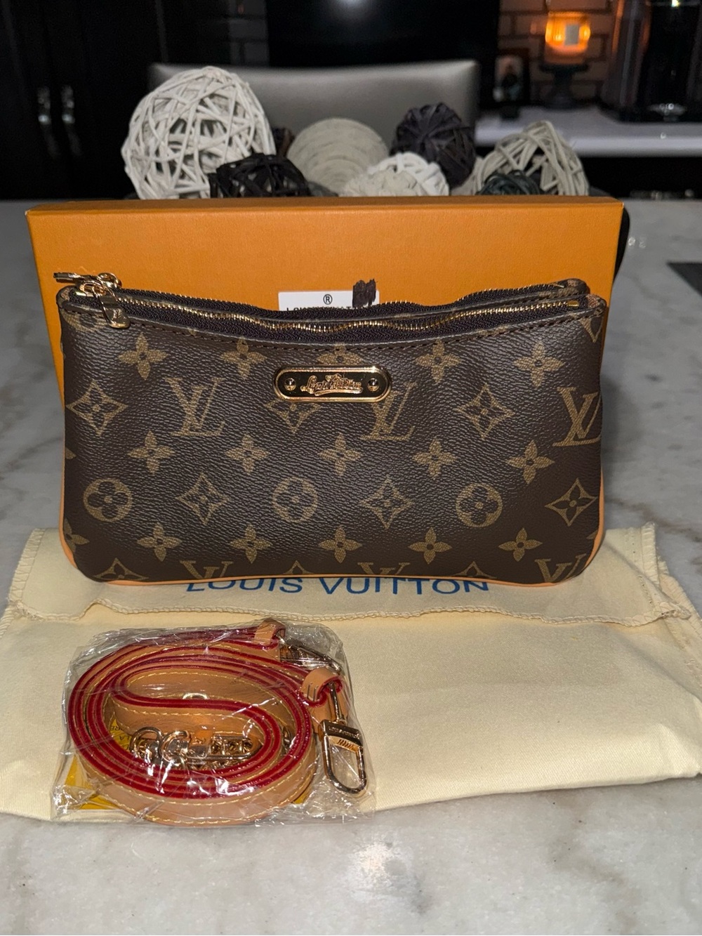 LV Pouchette Liv